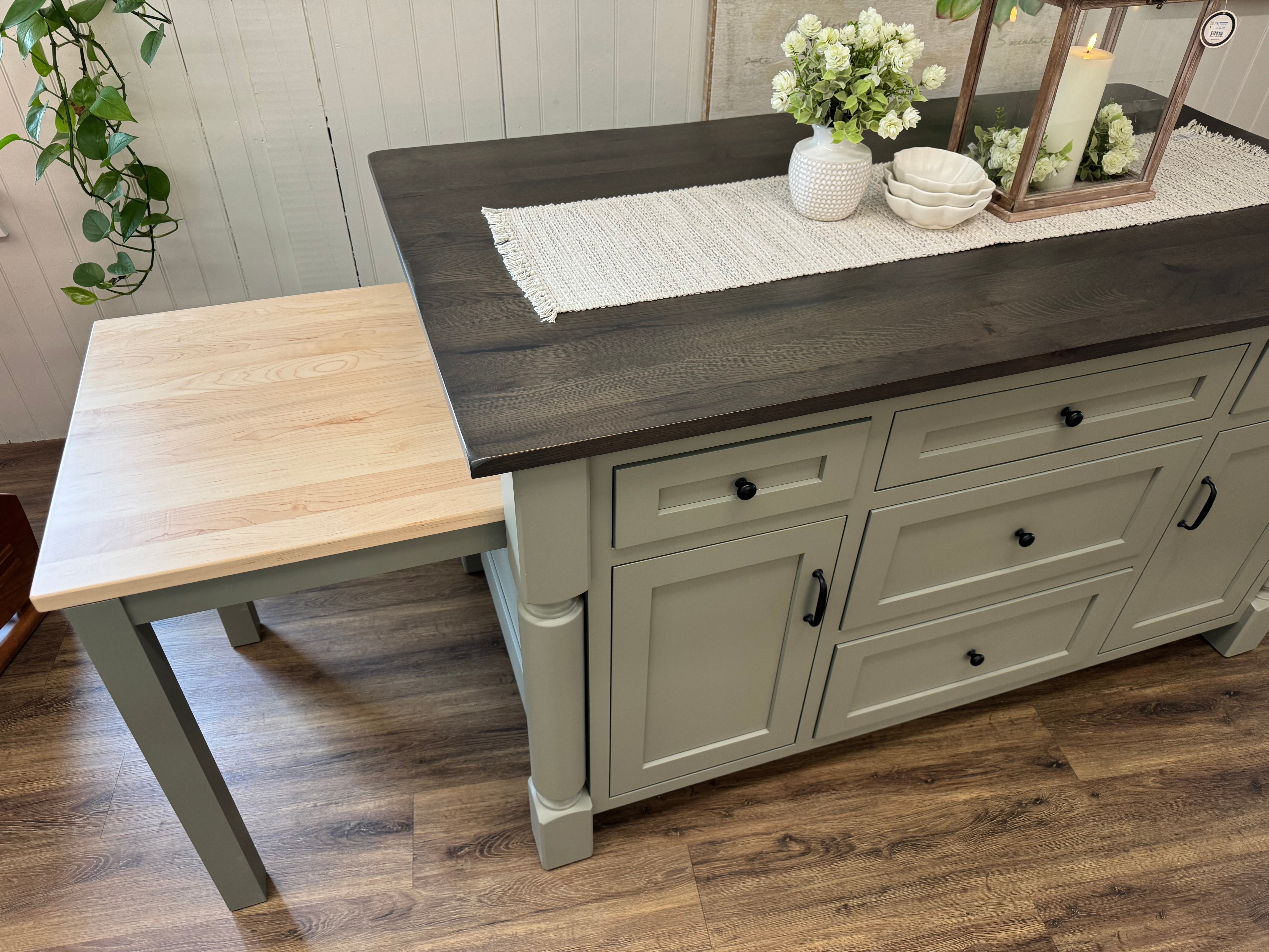 Top view of an Amish made solid hardwood kitchen island with five drawers and two doors and a slide out table extension on the left side - handcrafted furniture