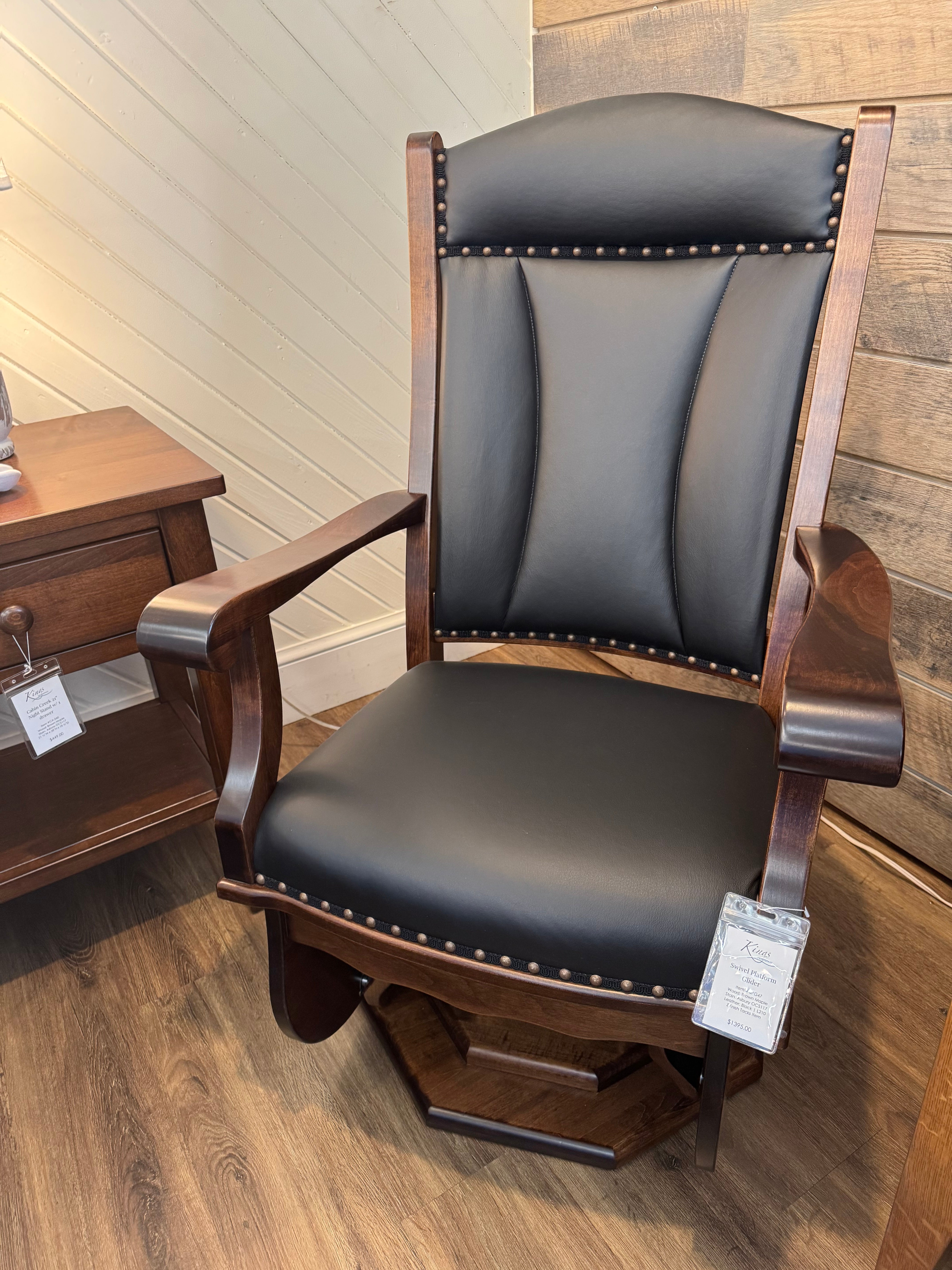 Handcrafted Amish swivel glider, rocker with maple frame and cushion seat in dark leather