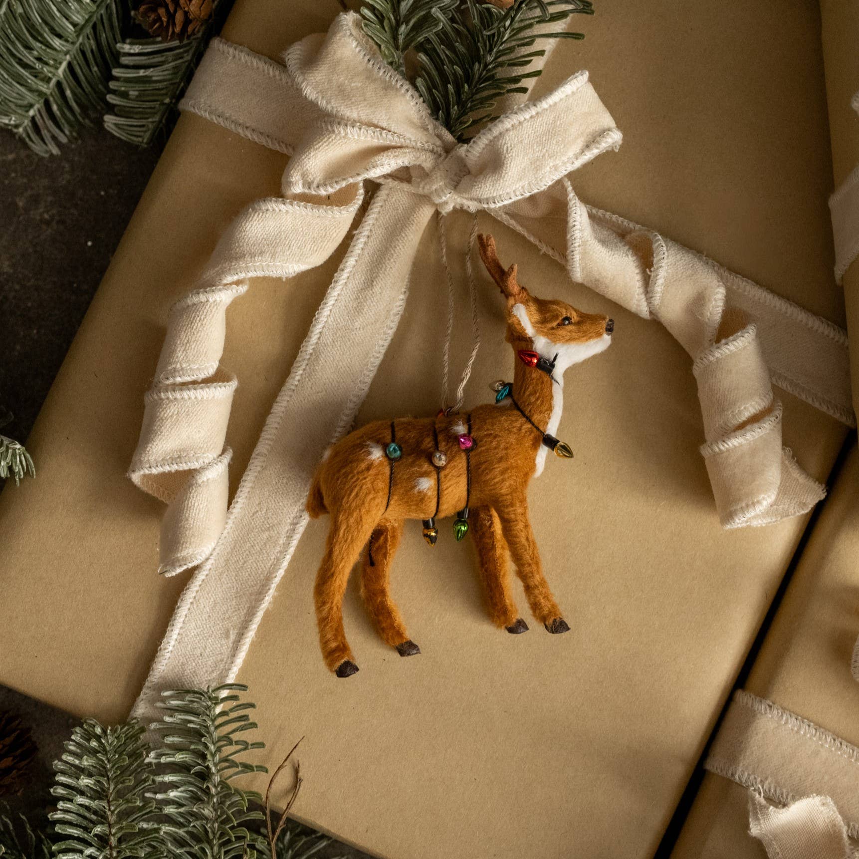 FUR DEER WRAPPED IN CHRISTMAS LIGHTS ORNAMENT
